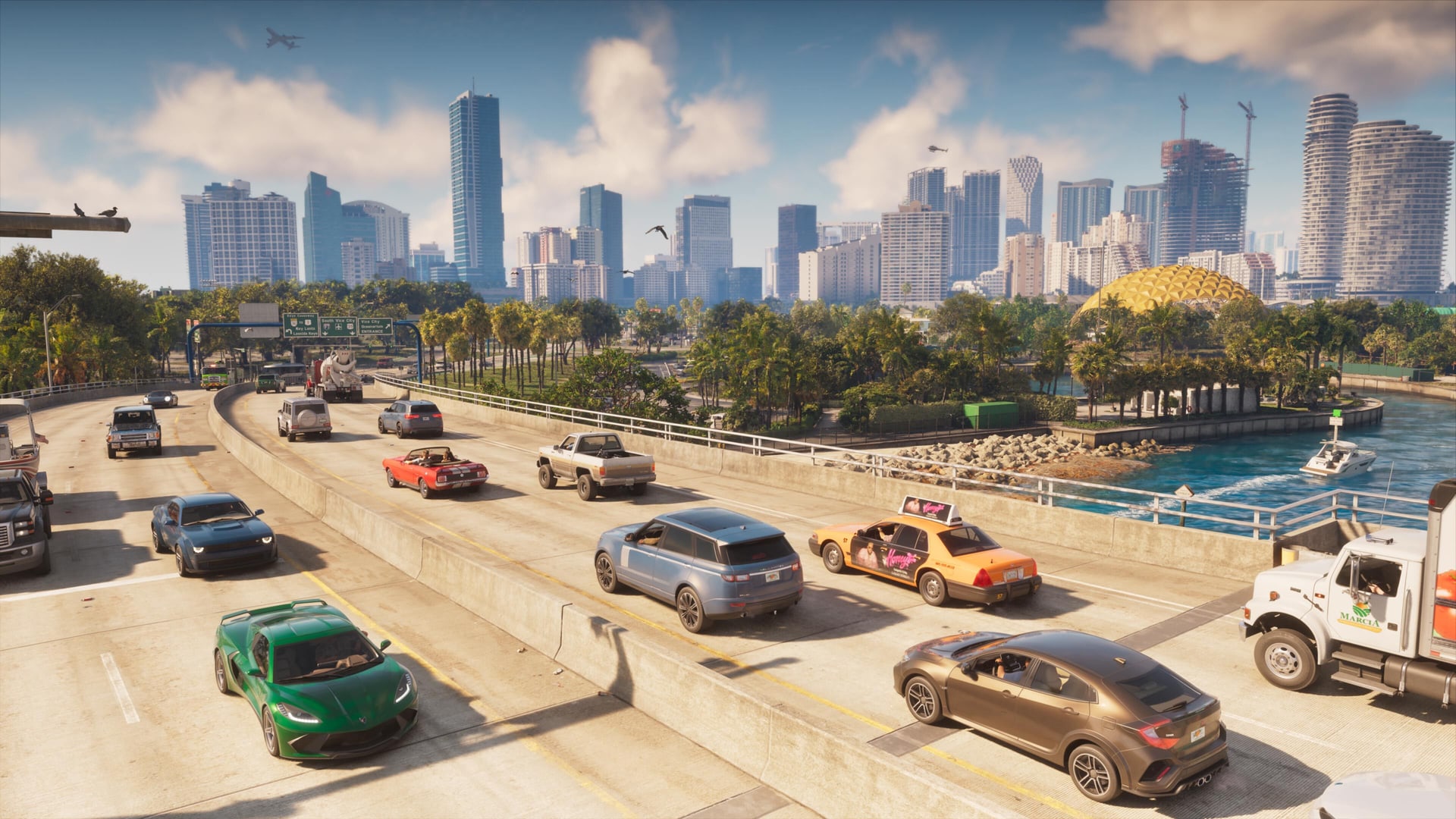 Vehicles on a busy Leonida highway with the Vice City skyline behind them, in the image Rockstar published with its radio announcement